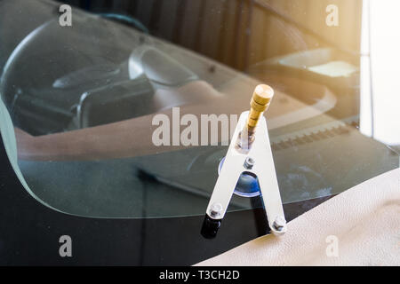 Using tools repairing to fix crack windshield Stock Photo