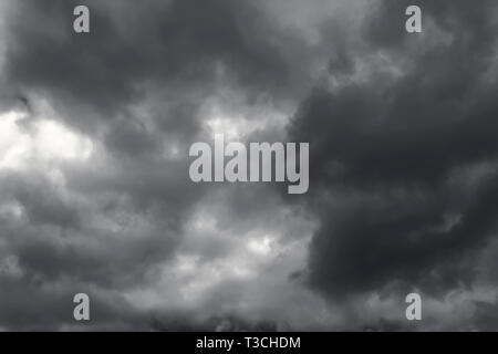 Dark and Dramatic Storm Clouds Area Background Stock Photo