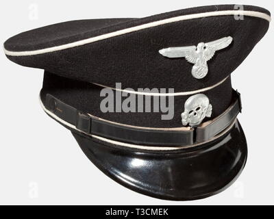 A visor cap for SS enlisted men/NCOs, for the black uniform Wartime production of black gabardine with white piping, a black visor with the SS-RZM stamp on the bottom, three-piece, black lacquered leather chinstrap, aluminium insignia, and brown linen and oilcloth lining with gold runes stamped under the maker's label in the top and a sewn-in SS-RZM label 'Vom Reichsführer-SS befohlene Ausführung' (Model Specified by the Reichsführer-SS). Black RZM label, 'Tuchmütze für SS' (Cloth Cap for SS), under the brown leather sweatband. Practically new, unworn condition. historic, h, Editorial-Use-Only Stock Photo