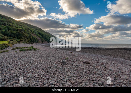 View from the pebble beach in Porlock Weir, Somerset, England, UK - looking at the Bristol channel Stock Photo