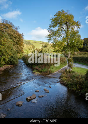 Crossing Badgworthy Water in Malmsmead, Devon, England, UK Stock Photo