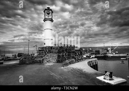 The harbour lighthouse at Kirkwall, Mainland, Orkney Islands. Stock Photo