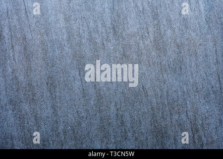 Close up of a gray granite wal tevture - image Stock Photo