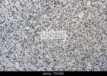 Close up of a gray granite wal tevture - image Stock Photo