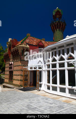 Comillas, Spain - July 3, 2017: Palace of El Capricho or Villa Quijano by the architect Gaudi in modernist style with tourists in the village of Comil Stock Photo