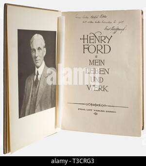 Adolf Hitler, a book from his private library Henry Ford, "My Life and Work", first German edition, 1924, Paul List Verlag, Leipzig. Pasteboard binding. A handwritten dedication from Hanfstaengl to Hitler on the title page, "Seinem lieben Adolph Hitler mit allen besten Wünschen für 1924, Ernst Hanfstaengl".(To his dear friend, Adolph Hitler, with very best wishes for 1924, Ernst Hanfstaengl), 328 pages. A few notes in pencil in Hitler's hand. In a later slipcase. Provenance: Taken from Hitler's private house on Prinzregentenplatz, people, 1920s, 20th century, NS, National S, Editorial-Use-Only Stock Photo