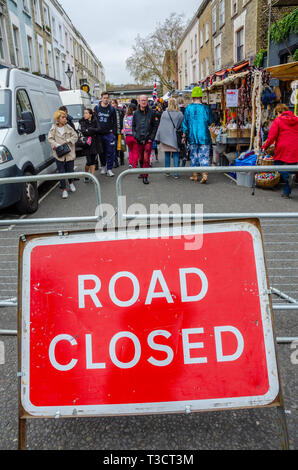 A big red signs tells drivers that the road is closed because of Portobello Road Market. Stock Photo