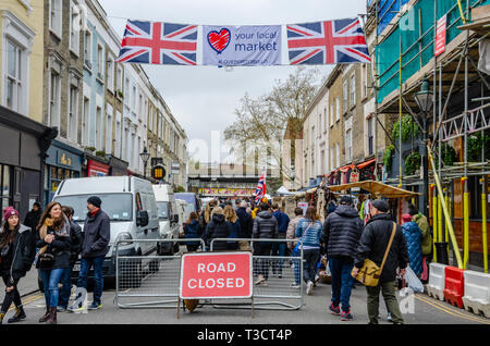 Portobello Road Market in London is popular with local people and tourists alike. Stock Photo