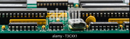 Computer mother board components showing close up of tiny parts in great detail Stock Photo