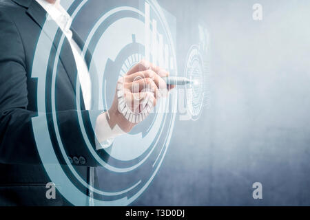 Businessman drawing with marker on virtual screen which display the interface of world map and binary code. Digital technology concept Stock Photo