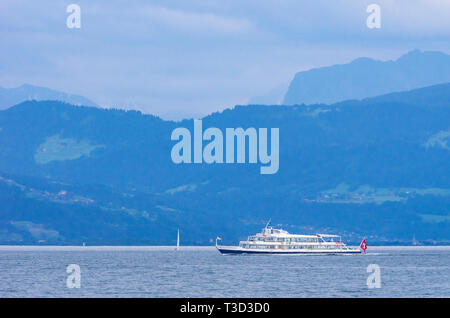 The MS ST. GALLEN crosses Lake Constance near Langenargen, Germany in a thunderstorm atmosphere. Stock Photo