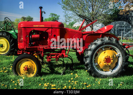 Vintage restored Massey Harris Pony tractor, Flemington, farm in New Jersey, USA, US, vintage tractors antique images historical garden tool Stock Photo