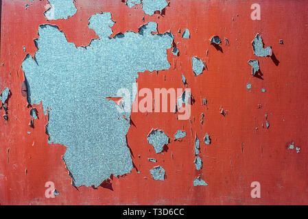 Texture of galvanized iron, painted red. Horizontal texture with red peeling old paint Stock Photo