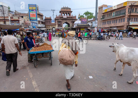 Busy people around Sadar Market Gate in Jodhpur, Rajasthan, India Stock Photo