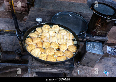 Deep fried pakoras in a street food vendor in Rajasthan, India Stock Photo