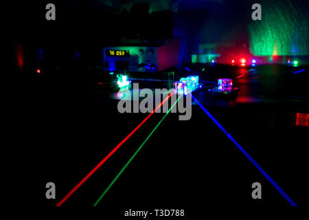 Laser beams in the laboratory of optical physics Stock Photo