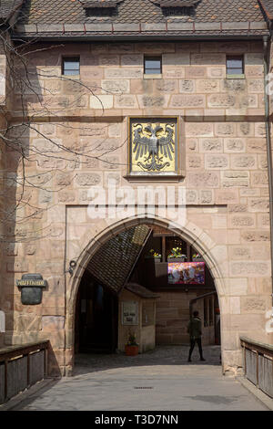 Imperial coat of arms at Craftsmen court (german: Handwerkerhof), old town of Nuremberg, Franconia, Bavaria, Germany Stock Photo