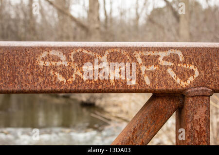 Graffiti on an iron bridge. Stock Photo