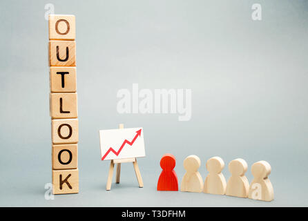 Wooden blocks with the word Outlook, business schedule and a team with a leader. Successful forecast and successful business. Concept perspectives in  Stock Photo