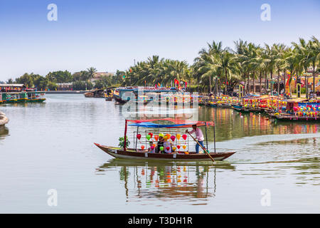 Lantern boat taking tourists on a trip along Son Thu Bon river, Hoi An, Quang Nam Provence, Vietnam, Asia, Stock Photo