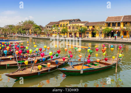 Lantern boats and traditional fishing boats on Son Thu Bon River, Hoi An, Quang Nam Provence, Vietnam, Asia Stock Photo