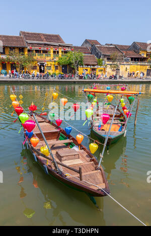 Lantern boats and traditional fishing boats on Son Thu Bon River, Hoi An, Quang Nam Provence, Vietnam, Asia Stock Photo