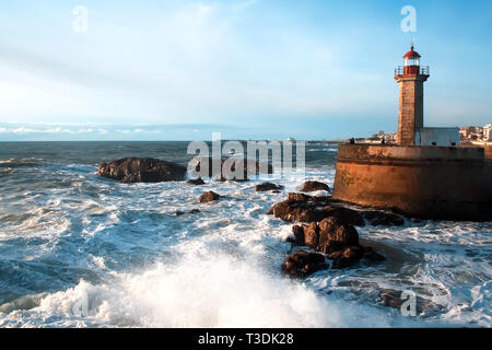 Seascape Rocks Illuminated By The Sunset Stock Photo - Alamy