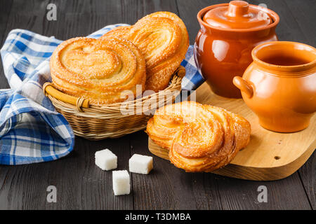 Freshly baked cinnamon rolls dusted with powdered sugar Stock Photo