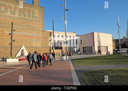 Group of schoolchildren outside the Black Cultural Archives entrance and Bovril building in Windrush Square Brixton South London SW2 UK  KATHY DEWITT Stock Photo