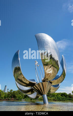 Floralis Genérica is a sculpture made of steel and aluminum located in Buenos Aires.  It weighs eighteen tons and is 23 meters high. Stock Photo