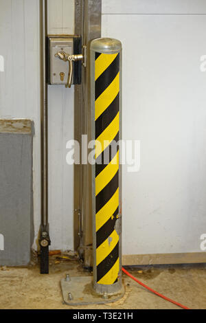 Safety Column Structural Post Protection in Distribution Warehouse Stock Photo