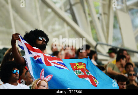 Fijian fans attending the Hong Kong Sevens Rugby tournament. Stock Photo