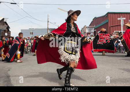 Native American Indian woman in traditional clothing dancing at the Whidbey Island Penn Cove Water Festival. Pacific Northwest Haida Tlingit tribes. Stock Photo