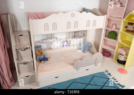 Interior of children room with bunk bed. unisex room for two children Stock Photo