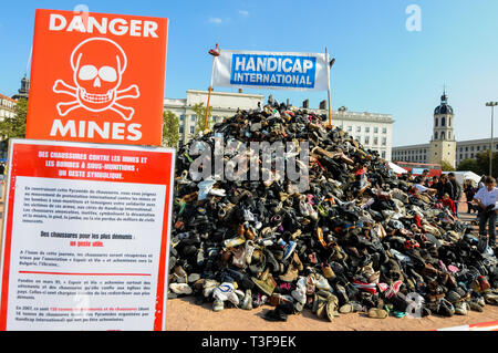 Pyamid of Shoes, Handicap International Anti-mines Day, Lyon, France Stock Photo