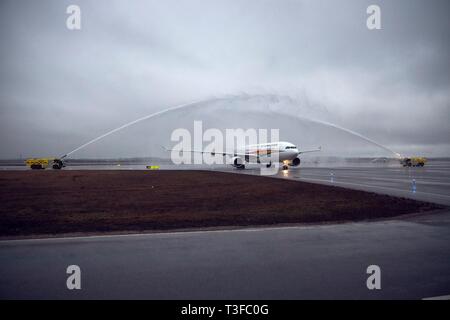 (190409) -- VANTAA, April 9, 2019 (Xinhua) -- Tibet Airlines' inaugural flight from Jinan, the capital city of eastern China's Shandong Province, lands at the Helsinki-Vantaa International Airport in Finland, April 8, 2019. An Airbus 330 operated by China Tibet Airlines landed at the Helsinki-Vantaa International Airport late on Monday, opening the weekly direct flights between Jinan, Shandong Province of China and Helsinki, capital of Finland. Tibet Airlines has one flight to Finland every week in April and will possibly run two weekly flights in June. (Xinhua/Finavia) Stock Photo