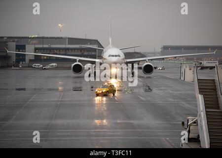 (190409) -- VANTAA, April 9, 2019 (Xinhua) -- Tibet Airlines' inaugural flight from Jinan, the capital city of east China's Shandong Province, lands at the Helsinki-Vantaa International Airport in Finland, April 8, 2019. An Airbus 330 operated by China Tibet Airlines landed at the Helsinki-Vantaa International Airport late on Monday, opening the weekly direct flights between Jinan, Shandong Province of China and Helsinki, capital of Finland. Tibet Airlines has one flight to Finland every week in April and will possibly run two weekly flights in June. (Xinhua/Matti Matikainen) Stock Photo