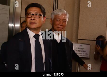 Hong Kong, CHINA. 9th Apr, 2019. 'Key initiator' of the 2014 UMBRELLA REVOLUTION ( or Umbrella Movement ) professor Chan Kin-man ( L ) and retired pastor Chu Yiu-ming ( R ) greet the medias at the entrance of the Court Building after convicted for taking part in the civil protest in the 2014 Umbrella Movement.April-9, 2019 Hong Kong.ZUMA/Liau Chung-ren Credit: Liau Chung-ren/ZUMA Wire/Alamy Live News Stock Photo