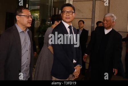 Hong Kong, CHINA. 9th Apr, 2019. Three 'key initiator' of the 2014 UMBRELLA REVOLUTION ( or Umbrella Movement ) professor Benny Tai ( L ) professor Chan Kin-man ( centre ) and retired pastor Chu Yiu-ming ( R ) walk out of Court Building to meet the media after convicted of their role in the 2014 massive civil disobedience. All 9 democracy advocates are convicted 'guilty' and released on bale.April-9, 2019 Hong Kong.ZUMA/Liau Chung-ren Credit: Liau Chung-ren/ZUMA Wire/Alamy Live News Stock Photo