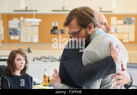 Potsdam, Germany. 09th Apr, 2019. The actors Michael Lott and Hendrik von Bültzingslöwen (l-r) embrace each other on set during the shooting of the second season of the ZDF series 'Soko Potsdam'. Credit: Annette Riedl/dpa-Zentralbild/ZB/dpa/Alamy Live News Stock Photo