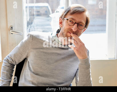 Potsdam, Germany. 09th Apr, 2019. The actor Hendrik von Bültzingslöwen sits on set during the shooting break of the second season of the ZDF series 'Soko Potsdam'. Credit: Annette Riedl/dpa-Zentralbild/ZB/dpa/Alamy Live News Stock Photo