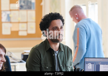 Potsdam, Germany. 09th Apr, 2019. The actor Omar El-Saeidi sits at his desk during the shooting of the second season of the ZDF series 'Soko Potsdam' on set. Credit: Annette Riedl/dpa-Zentralbild/ZB/dpa/Alamy Live News Stock Photo