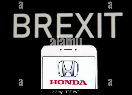 Hong Kong. 5th Apr, 2019. In this photo illustration a Japanese automobile multinational conglomerate Honda logo is seen on an Android mobile device with a Brexit message in the background. Credit: Budrul Chukrut/SOPA Images/ZUMA Wire/Alamy Live News Stock Photo