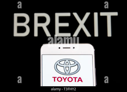 Hong Kong. 5th Apr, 2019. In this photo illustration a Japanese multinational automobile manufacturer Toyota Motor logo is seen on an Android mobile device with a Brexit message in the background. Credit: Budrul Chukrut/SOPA Images/ZUMA Wire/Alamy Live News Stock Photo