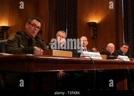 Washington DC, USA. 09th Apr, 2019. From left to right: Rodolfo Karisch, Rio Grande Valley Sector Chief Patrol Agent, US Border Patrol, US Customs and Border Protection, U.S. Department of Homeland Security; Randy Howe, Executive Director for Operations Office of Field Operations, US Customs and Border Protection, US Department of Homeland Security; Timothy Tubbs, Deputy Special Agent in Charge- Laredo, Texas, Homeland Security Investigations, US Immigration and Customs Enforcement, US Department of Homeland Security; Commander Jonathan White, PH.D., USPH, Deputy Director for Children's Progra Stock Photo