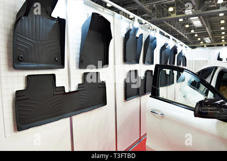 Rubber mats for car interior in a shop Stock Photo