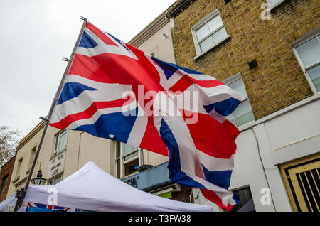 British Union Jack flag flying in Portobello Road in London. Stock Photo