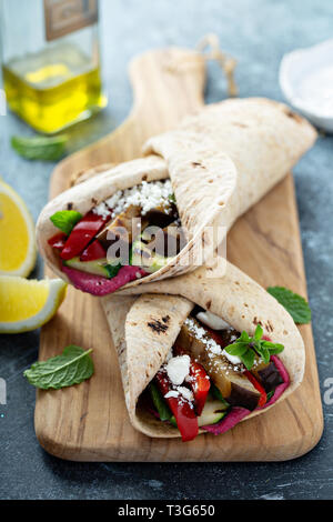 Grilled vegetables and hummus wraps Stock Photo