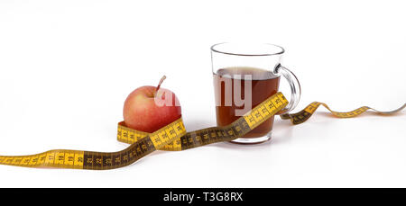 Red apple and yellow measuring tape to symbolize an healthy diet and body weight  control Stock Photo - Alamy