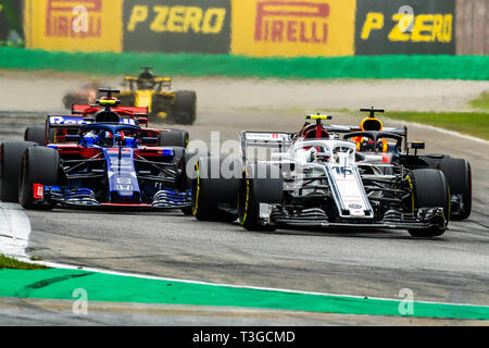 Monza/Italy - 16 Charles Leclerc leading a fierce battle at the Roggia chicane during the Italian GP Stock Photo